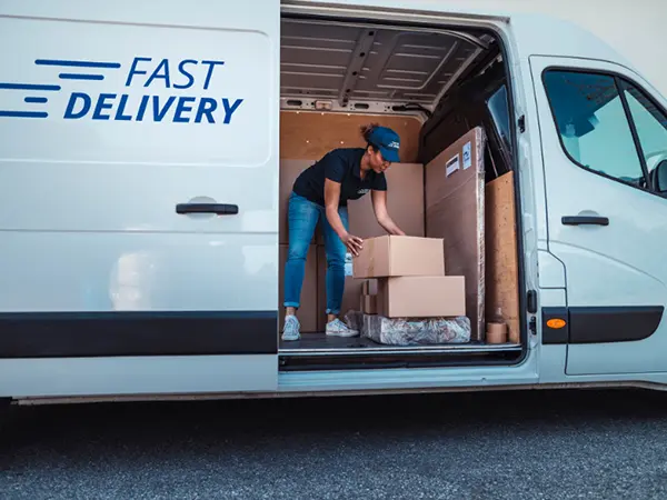 Logistics person working in a logistics van